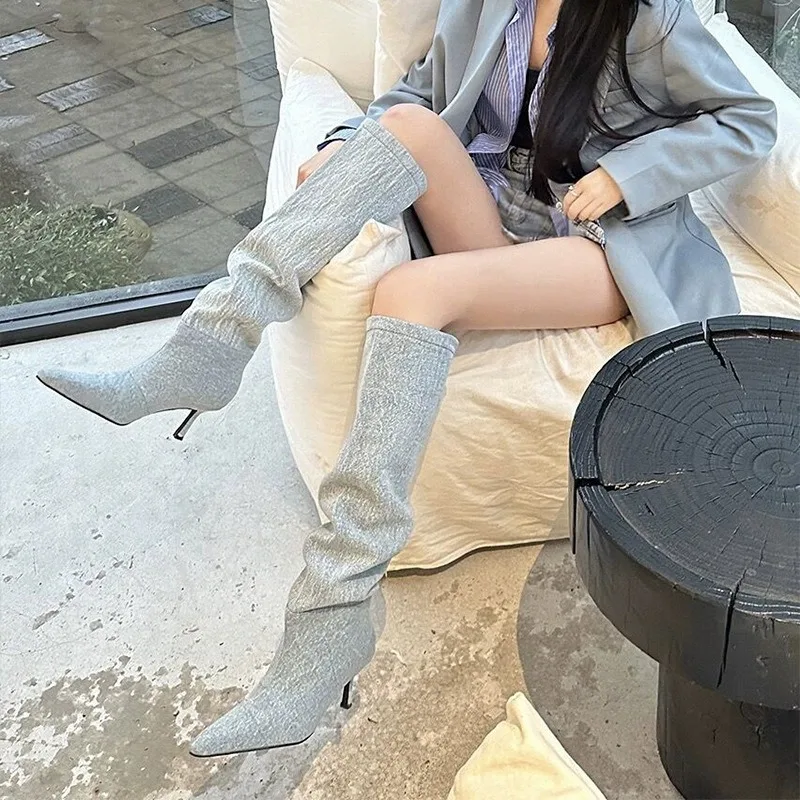 Botines doblados por encima de - Jeans reseña y precio